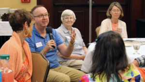 group of people discussing support groups