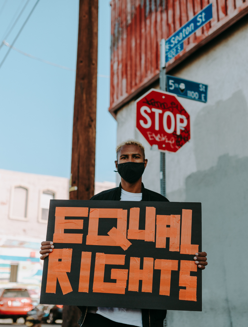 Man holding Equal Rights sign